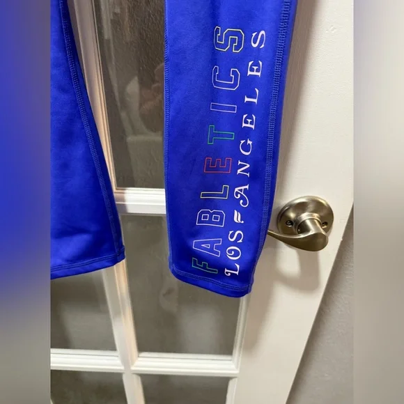 Fabletics Trinity Motion365+High-Waisted Capri/Trinity High Impact Sports Bra - Picture 11 of 15